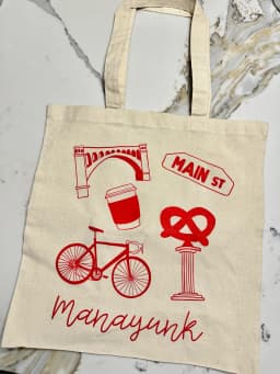 Custom screen printed Manayunk tote bag in red ink on natural canvas