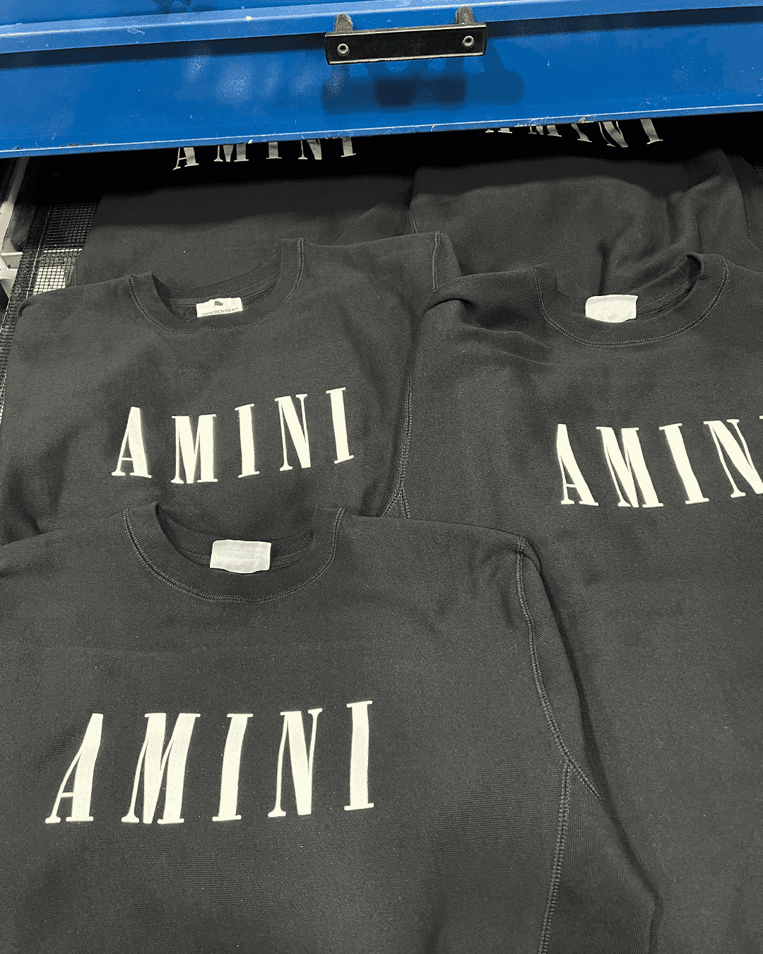 Silk screen printing past project — custom branded shirts by Tee Vision