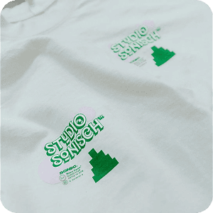 One-color green screen print on white t-shirt for Studio Sonisch brand