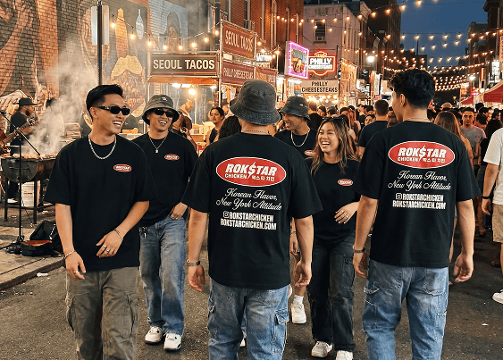 Group wearing custom-printed Tee Vision shirts at a Philly event