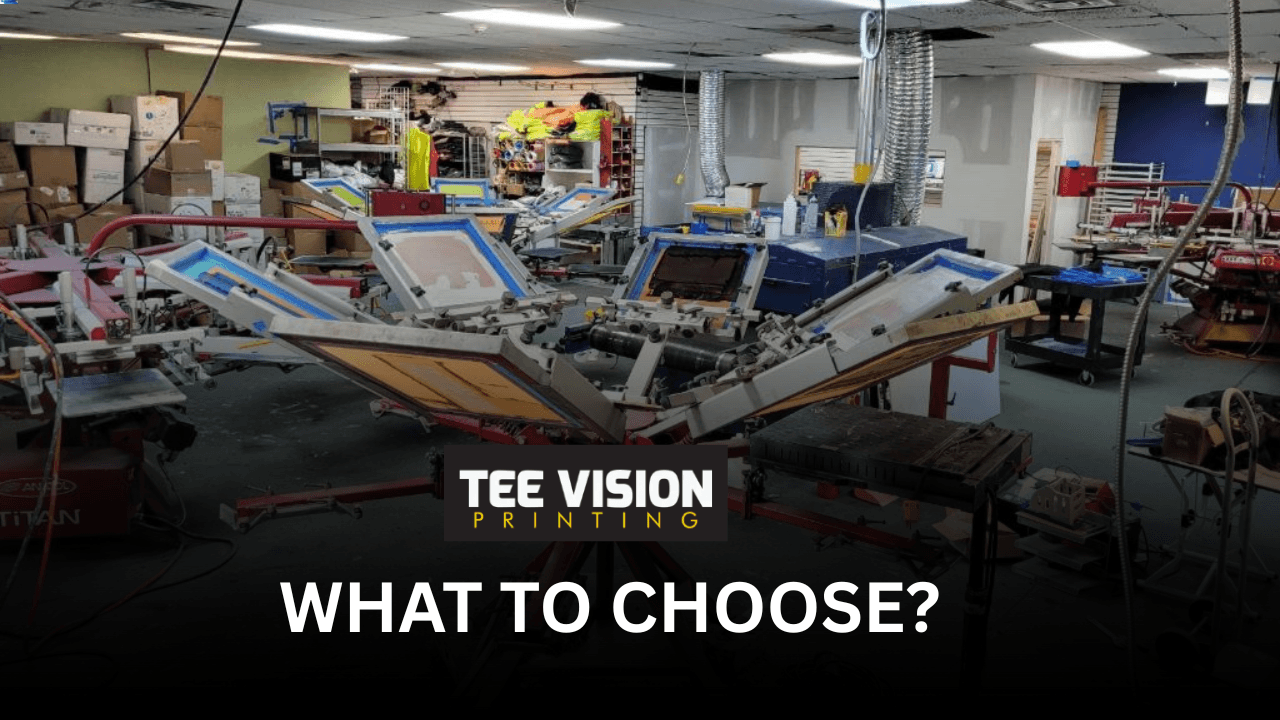 Embroidery vs. Screen Printing decision-making visual—professional screen printing workshop setup at Tee Vision Printing, highlighting multi-color apparel production.