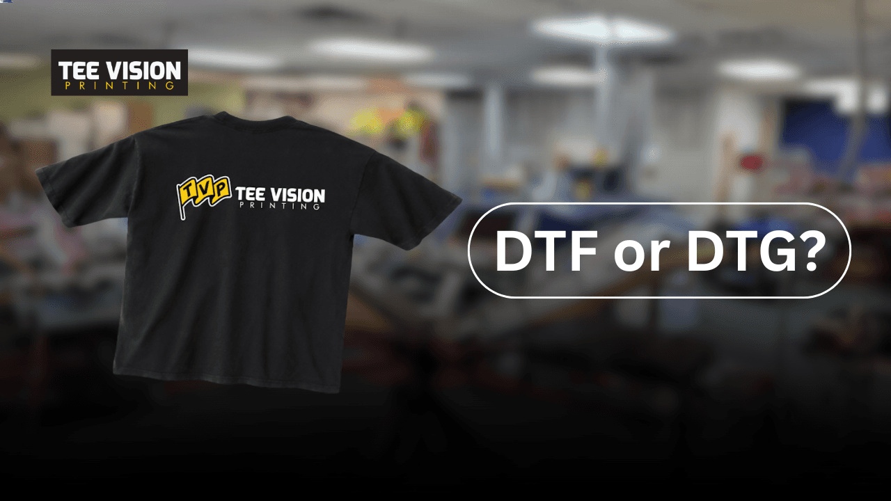 Promotional t-shirt with Tee Vision Printing logo and text “DTF or DTG?” highlighting what’s the difference between DTF and DTG printing methods.