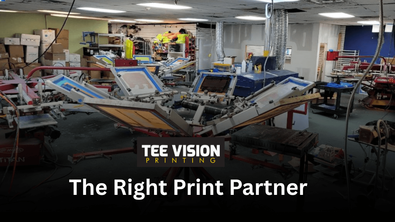 Professional screen printing setup at Tee Vision Printing, demonstrating how can churches use t-shirts to promote events with high-quality production.