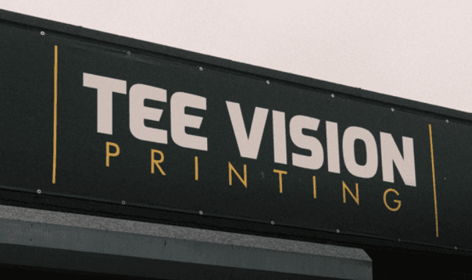 Tee Vision Printing signage, the printing partner behind Rob Kang Owl Breakfast custom t-shirts and branded apparel.