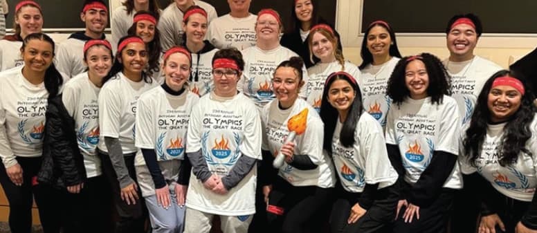 Arcadia University students in Philadelphia wearing custom printed t-shirts made by Tee Vision Printing, showing school spirit with the university logo and colors.