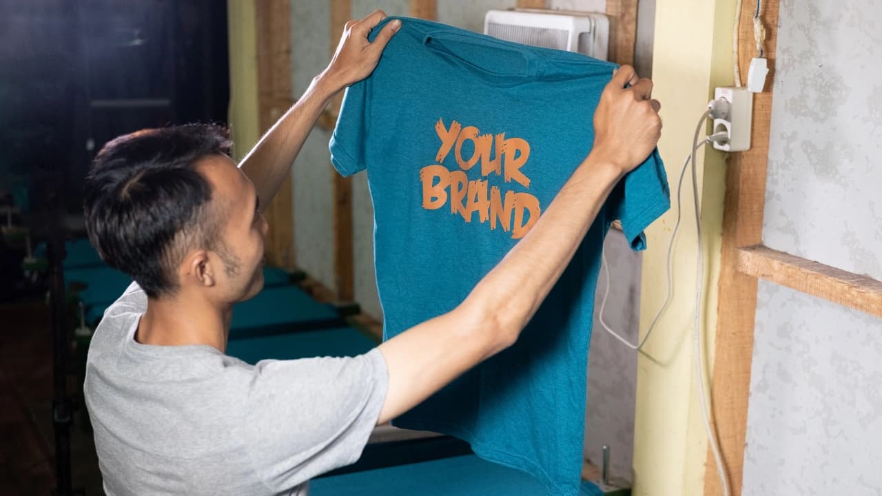 Use our t-shirt logo design maker to create your own graphic design apparel and build your brand identity with custom tees.